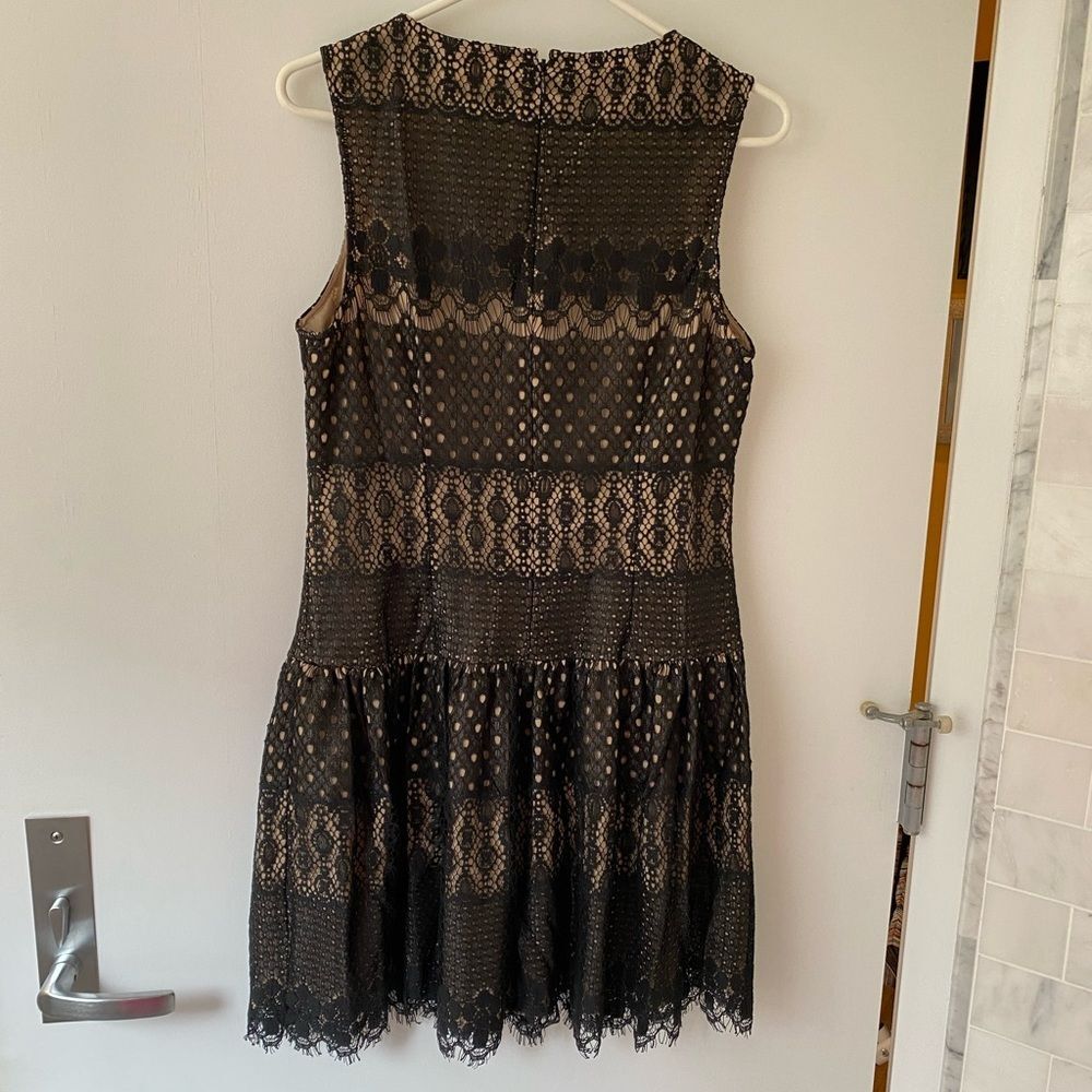 Woman’s lace illusion mini dress - Picture 2 of 3